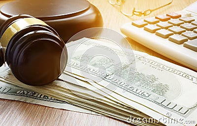 Bail bond concept. Gavel and dollar banknotes. Stock Photo