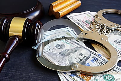 Bail bond. Corruption. Gavel, handcuffs and money. Stock Photo