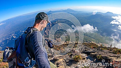 Bajawa - A couple dowing down the volcano Inierie Stock Photo