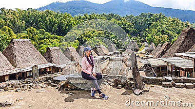 Bajawa - Girl in traditional village Stock Photo