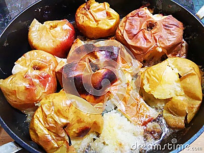 Baked apples in the oven tray Stock Photo