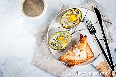 Baked avocado with egg Stock Photo