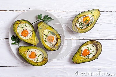 Baked avocado with eggs Stock Photo