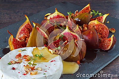 Baked Camembert with figs Stock Photo