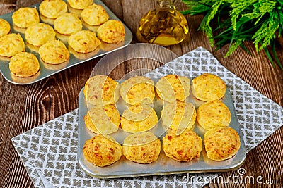 Baked cheese bread called chipa in baking tray Stock Photo