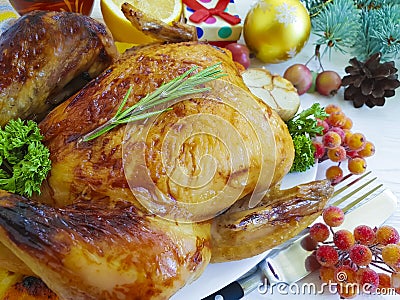 baked chicken fried whole delicious setting decoration dinner homemade cooked christmas white on a wooden background Stock Photo