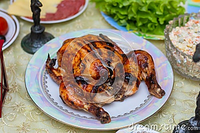 Baked chicken on a plate Stock Photo