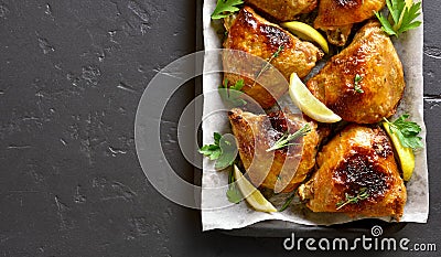 Baked chicken thighs Stock Photo