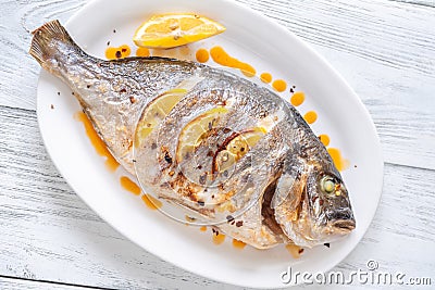 Baked dorado fish Stock Photo