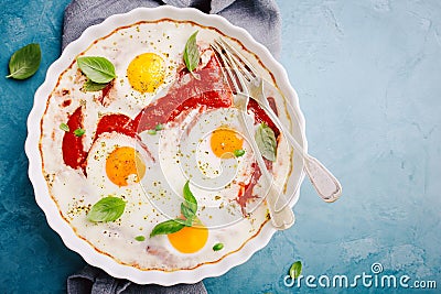 Baked eggs shakshouka in baked form Stock Photo