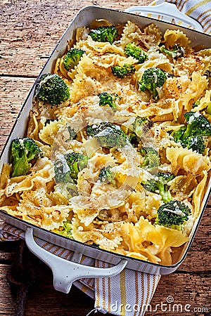 Baked farfalle pasta casserole with broccoli Stock Photo