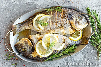 Baked fish dorado. Sea bream or dorada fish grilled Stock Photo