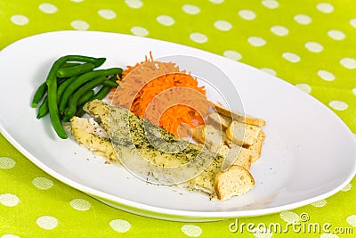 Baked fish with green beans Stock Photo