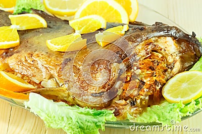 Baked fish stuffed with vegetables Stock Photo
