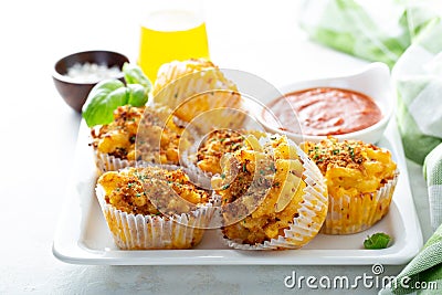 Baked mac and cheese muffins Stock Photo