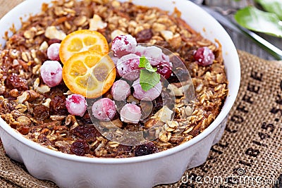 Baked oatmeal with carrot, walnuts and raisins Stock Photo