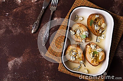 Baked pears with nuts Stock Photo