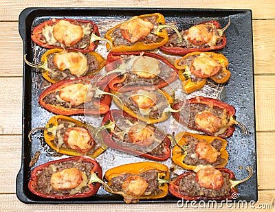 Baked pepper with meat, cheese and tomatoes. Stock Photo