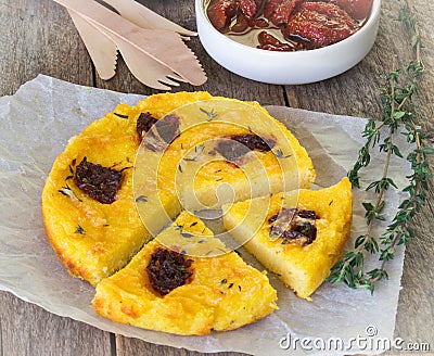 Baked polenta with tomatoes Stock Photo