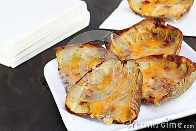 Baked potato skins and cheese Stock Photo