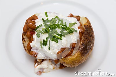 Baked Potatoe with Beans, Cottage Cheese and Chives Stock Photo