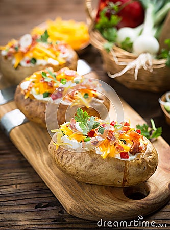 Baked potatoes with cheese and bacon Stock Photo