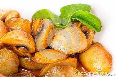 Baked potatoes and mushrooms. Stock Photo