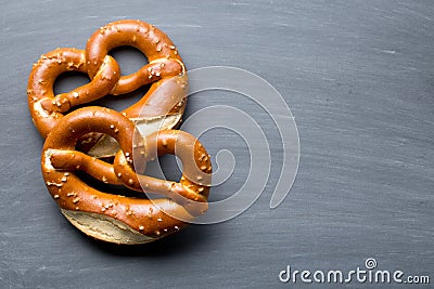 Baked pretzel on a chalkboard Stock Photo