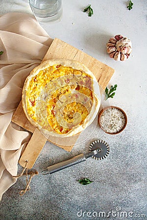 Baked quiche pie with sausages, cheese and eggs fro breakfast Stock Photo