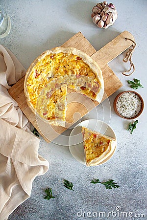 Baked quiche pie with sausages, cheese and eggs fro breakfast Stock Photo