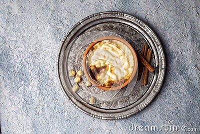 Baked rice pudding turkish milky dessert sutlac (Turkish name firin sutlac Stock Photo