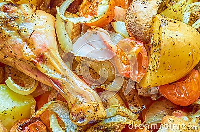 Baked roast chicken legs with various vegetables Stock Photo