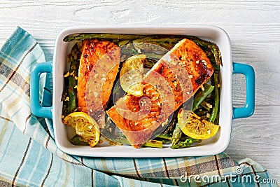 Baked salmon fish fillet with asparagus and lemon Stock Photo
