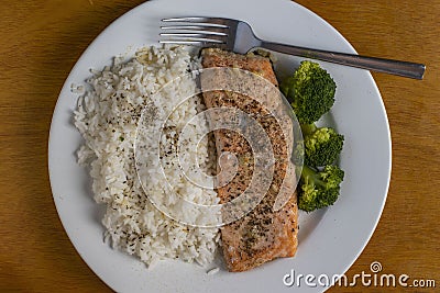 Baked season salmon with rice and broccoli Stock Photo