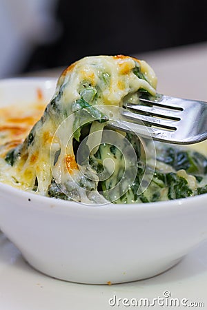 Baked spinach with cheese Stock Photo