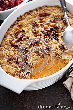 Sweet potato casserole with pecan topping Stock Photo