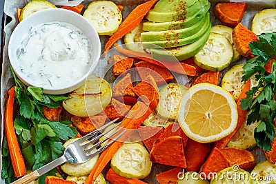 Baked sweet potato, zucchini and carrots Stock Photo