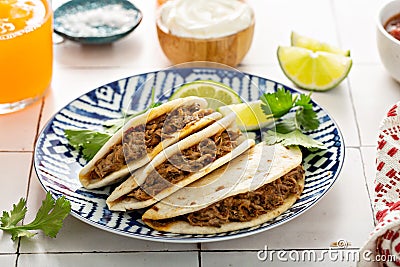 Baked tacos with Mexican Shredded Beef and cheese Stock Photo