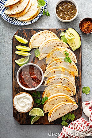 Baked tacos with pulled chicken and cheese Stock Photo