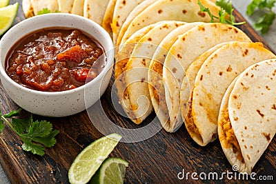 Baked tacos with pulled chicken and cheese Stock Photo