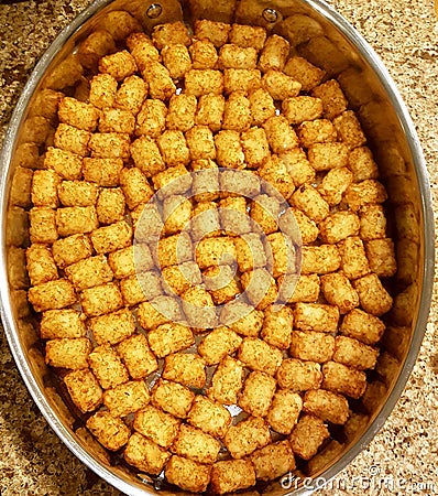 Baked tater tot on baking dish Stock Photo