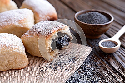 Baked yeast dumpling with poppy seed filling Stock Photo