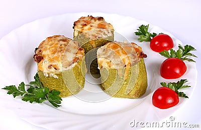 Baked zucchini filled with vegetables Stock Photo