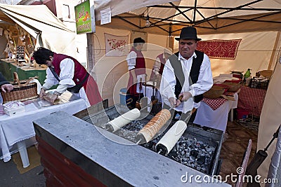 Baker make traditional Hungarian cake at a festival Editorial Stock Photo