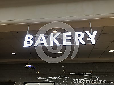 Bakery name board fixed for an newly opened business of selling baked items such as cakes bread in the event of functions upon Stock Photo