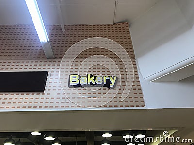 Bakery name board fixed for an newly opened business of selling baked items such as cakes bread in the event of functions upon Stock Photo
