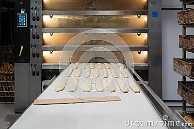 Bakery preparing and selling tasty eclairs Stock Photo