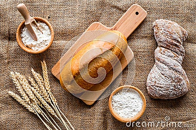 Bakery set with fresh wheaten bread on table rystic background top view Stock Photo