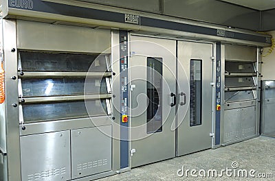 At the bakery: three-section electric oven prepared for baking bread Editorial Stock Photo