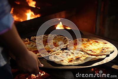 Baking of Arabs India - Pakistan Naan Roti Parata Stock Photo